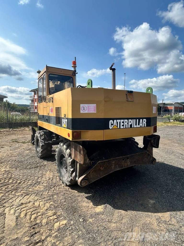 CAT 214 Bageri točkaši