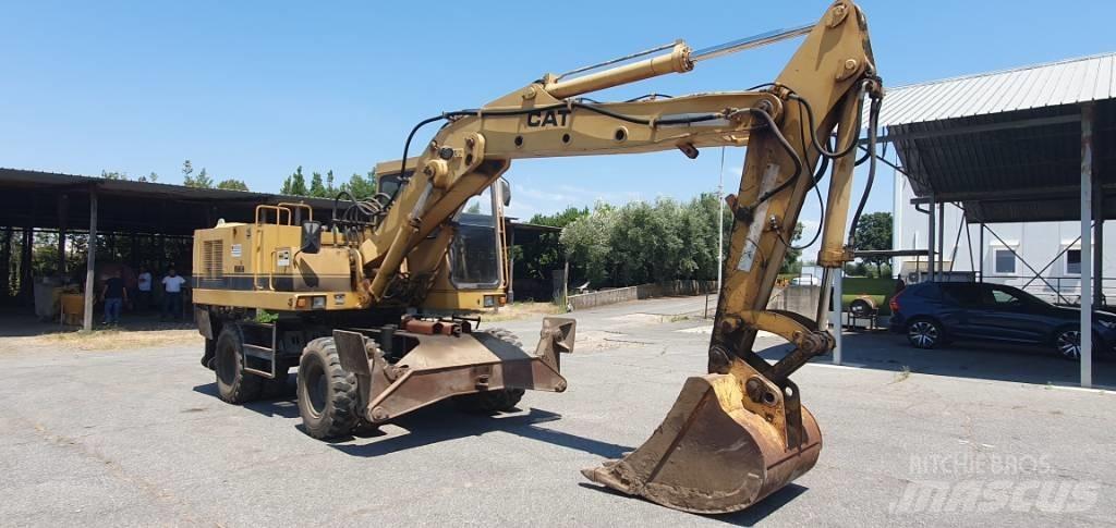 CAT 214 B Bageri točkaši