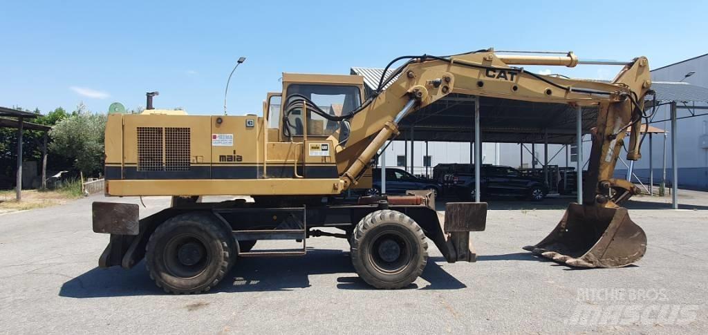 CAT 214 B Bageri točkaši