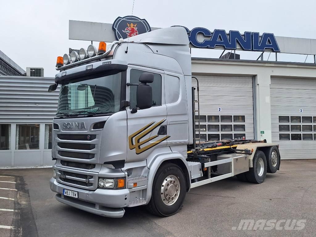 Scania R 580 LB Rol kiper kamioni sa kukom za podizanje tereta