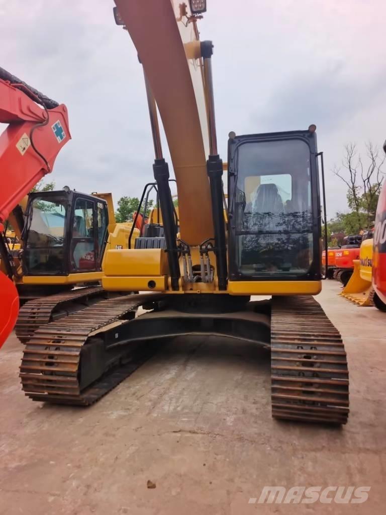 CAT 323 GC Bageri guseničari