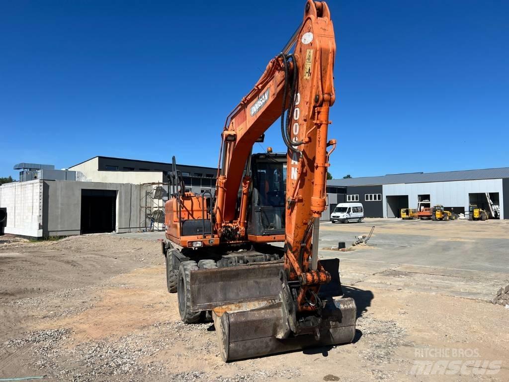 Doosan DX 140 W Bageri točkaši
