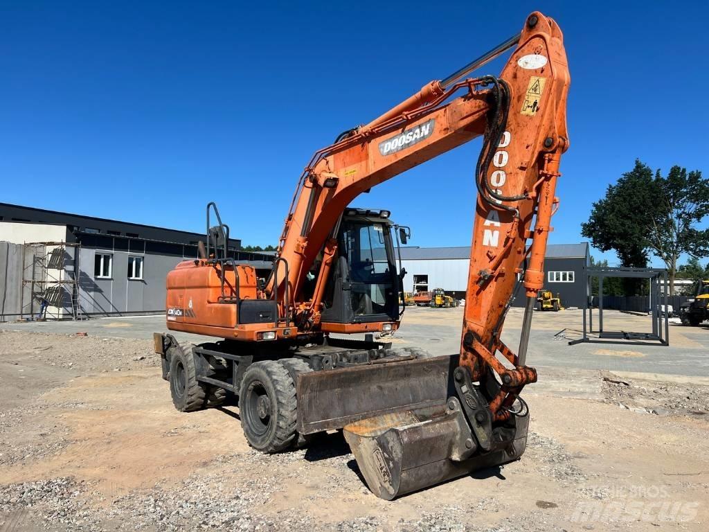 Doosan DX 140 W Bageri točkaši