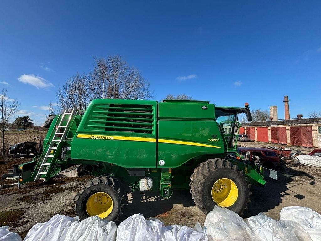 John Deere T670 Kombajni