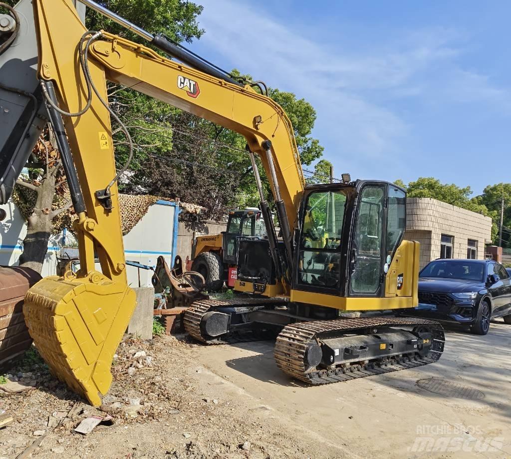 CAT 310 Bageri guseničari