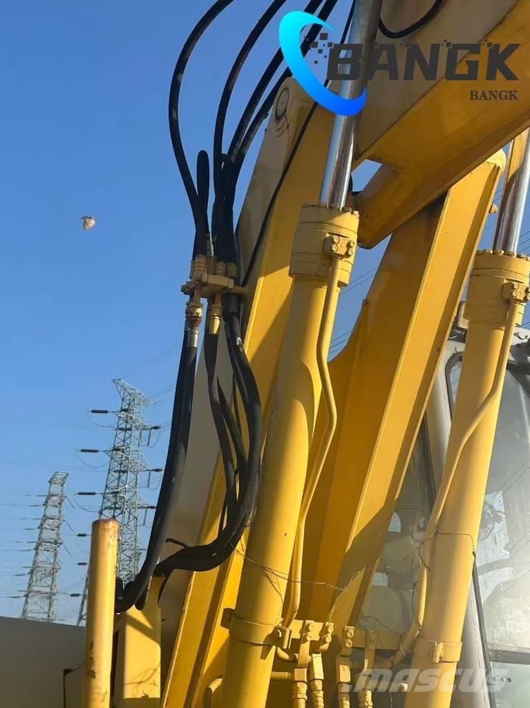  KOMΛ1'SU PW128us Bageri točkaši