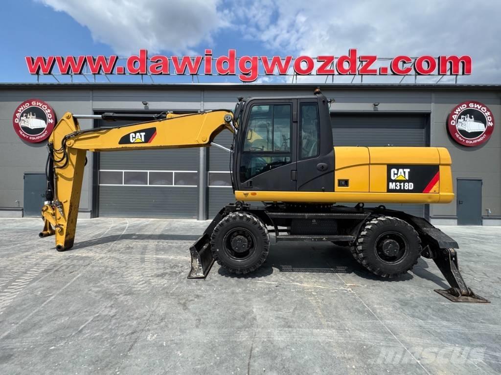 CAT M 318 D Bageri točkaši