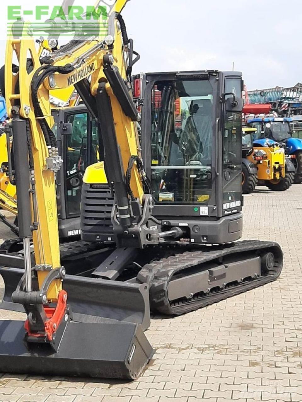 New Holland e65d Bageri točkaši