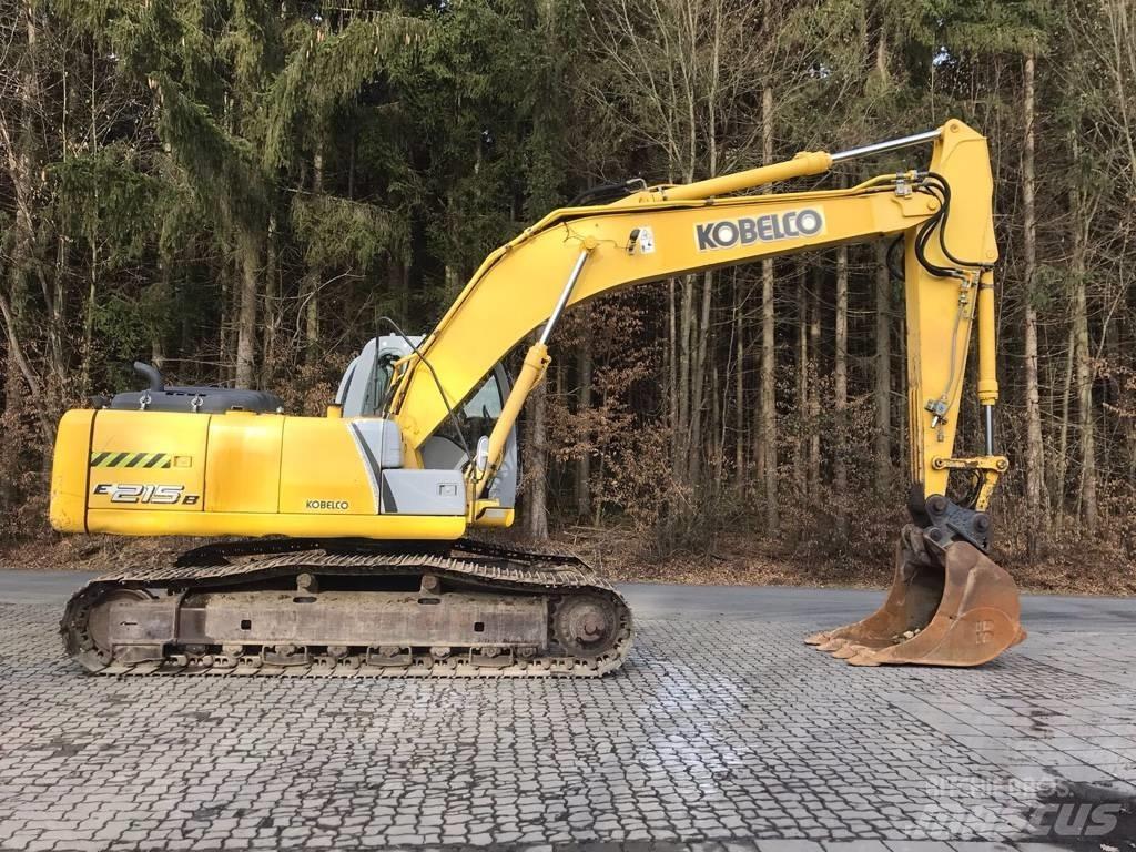 New Holland E 215 B Bageri guseničari