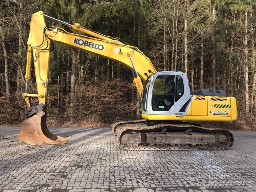 New Holland E 215 B Bageri guseničari