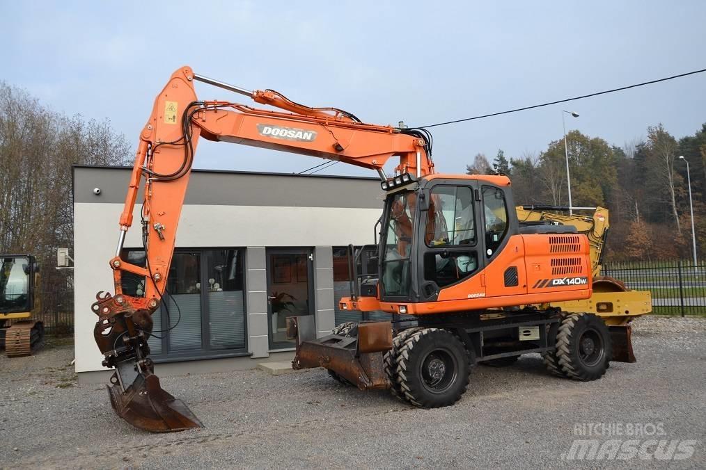 Doosan DX 140 W Bageri točkaši