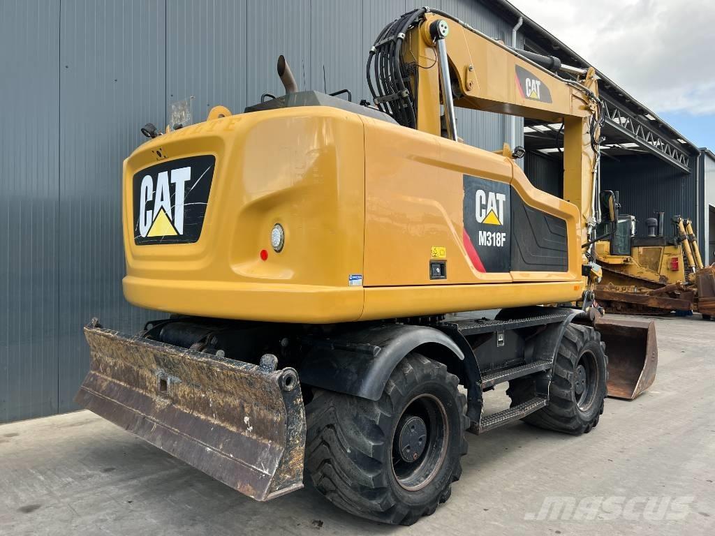 CAT M318F Bageri točkaši