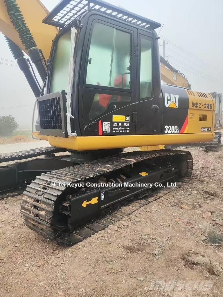 CAT 323 Bageri guseničari