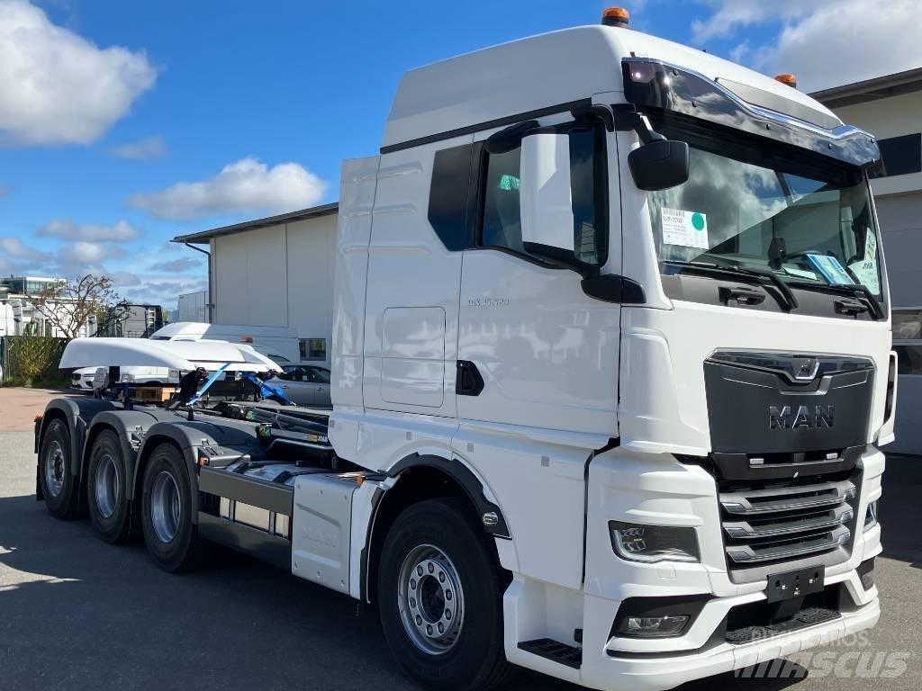 MAN TGX 35.520 Rol kiper kamioni sa kukom za podizanje tereta