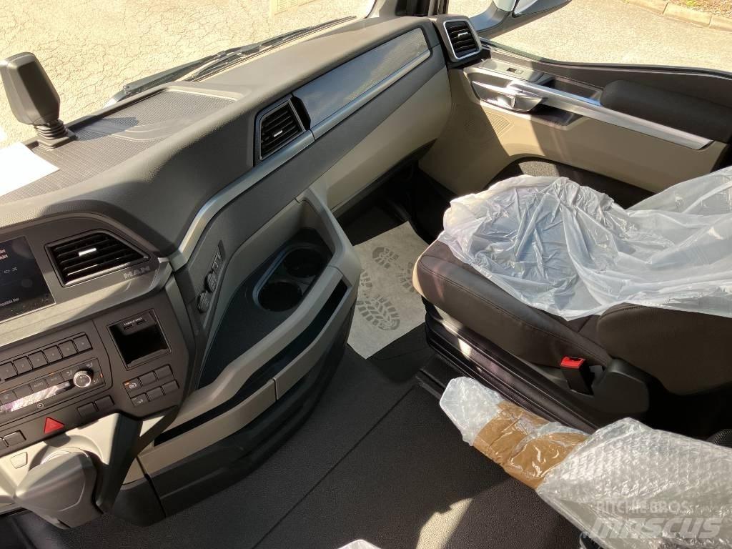 MAN TGX 35.520 Rol kiper kamioni sa kukom za podizanje tereta