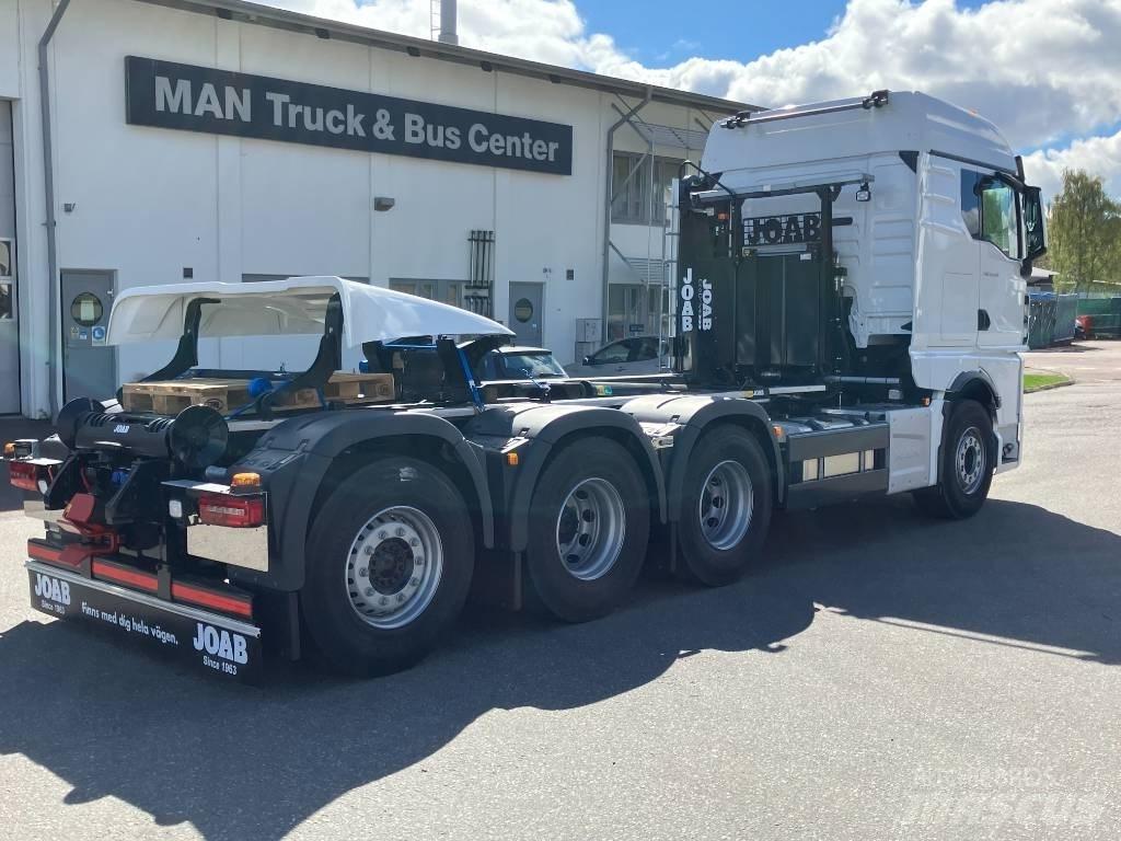 MAN TGX 35.520 Rol kiper kamioni sa kukom za podizanje tereta
