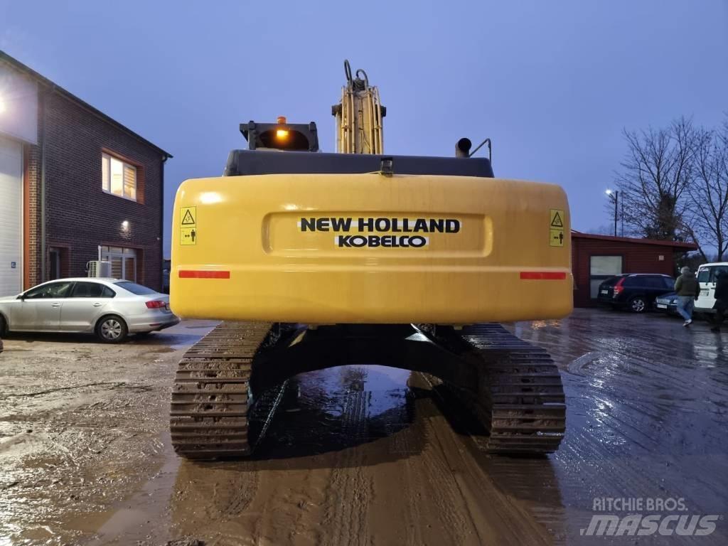 New Holland E 385 Bageri guseničari