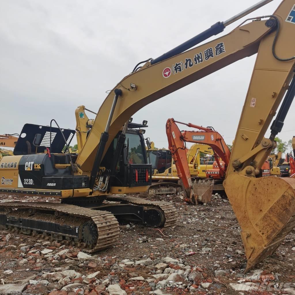 CAT 323DL Bageri guseničari