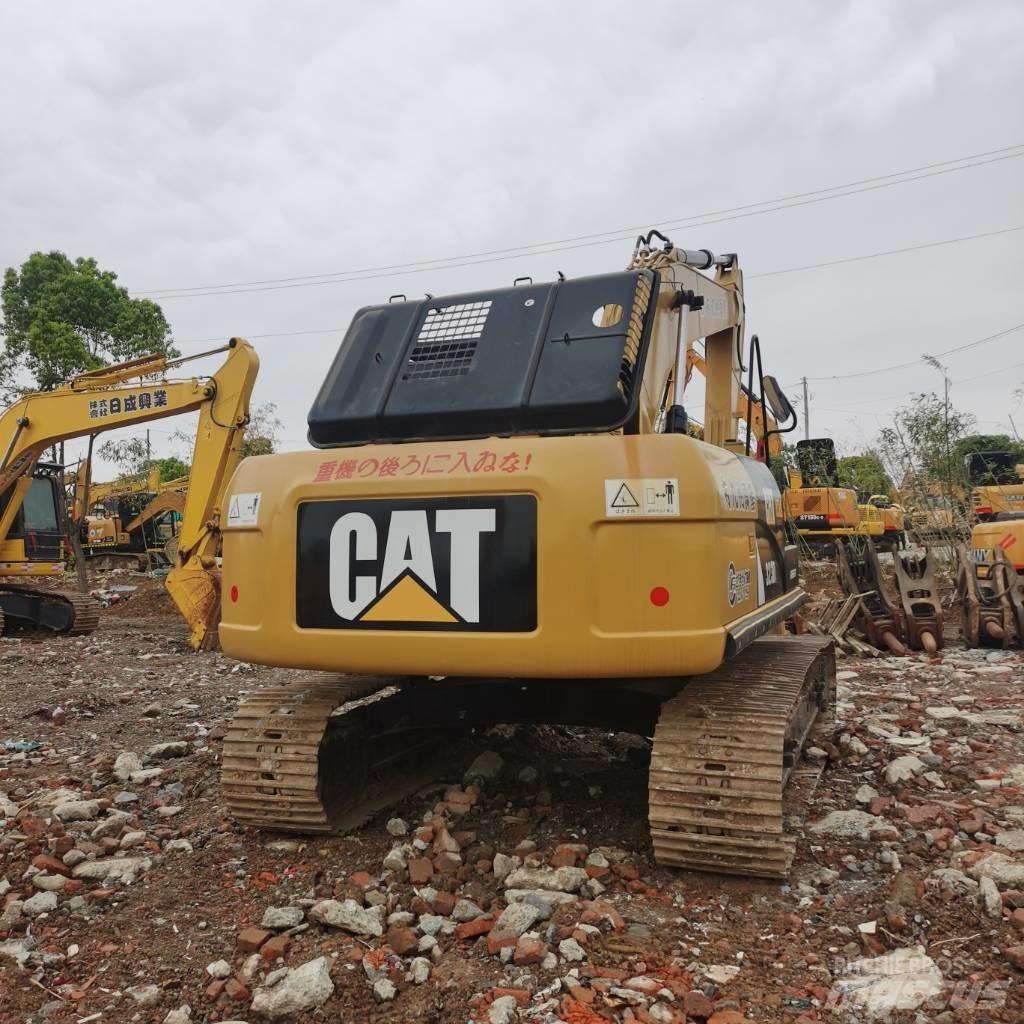 CAT 323DL Bageri guseničari
