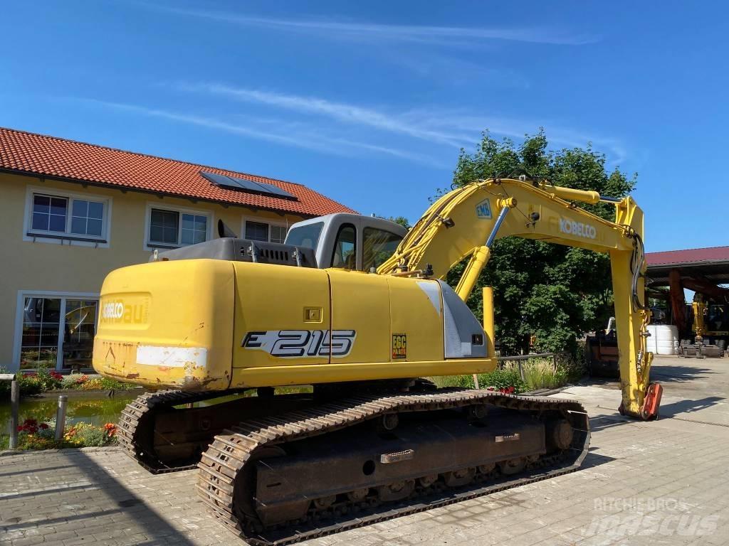 New Holland E 215 Bageri guseničari