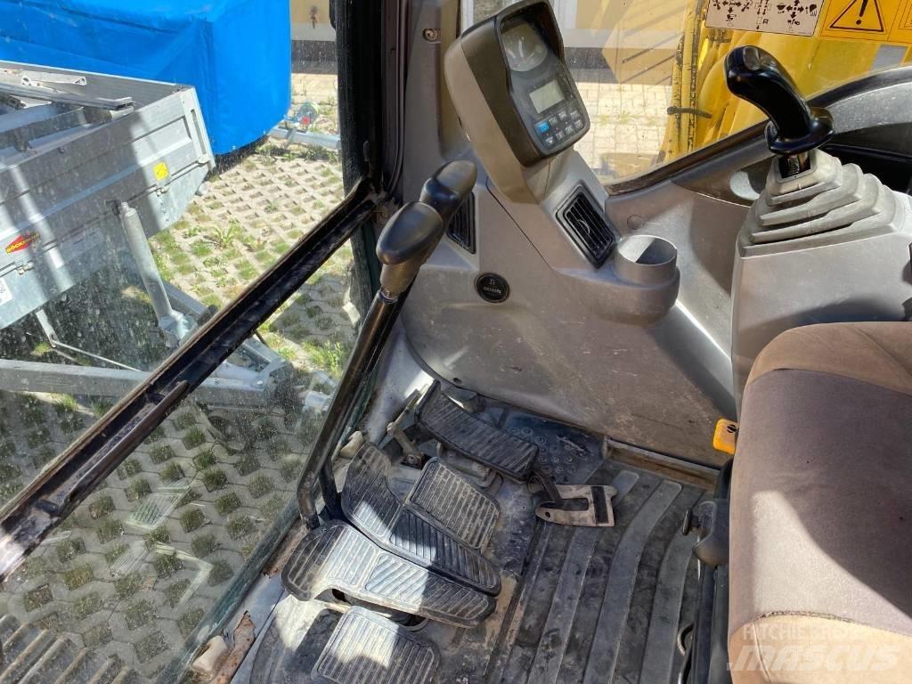 New Holland E 215 Bageri guseničari