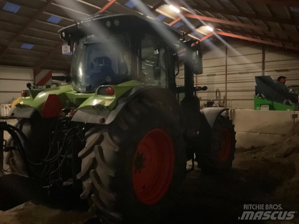 CLAAS ARION 650 cis + Traktori