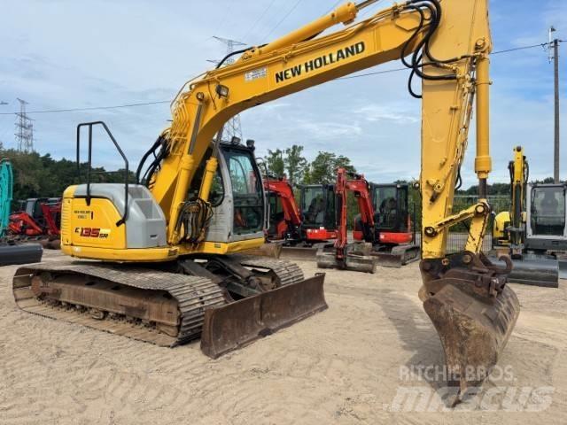 New Holland E 135 SR Bageri guseničari