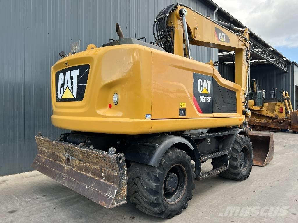 CAT M318F Bageri točkaši