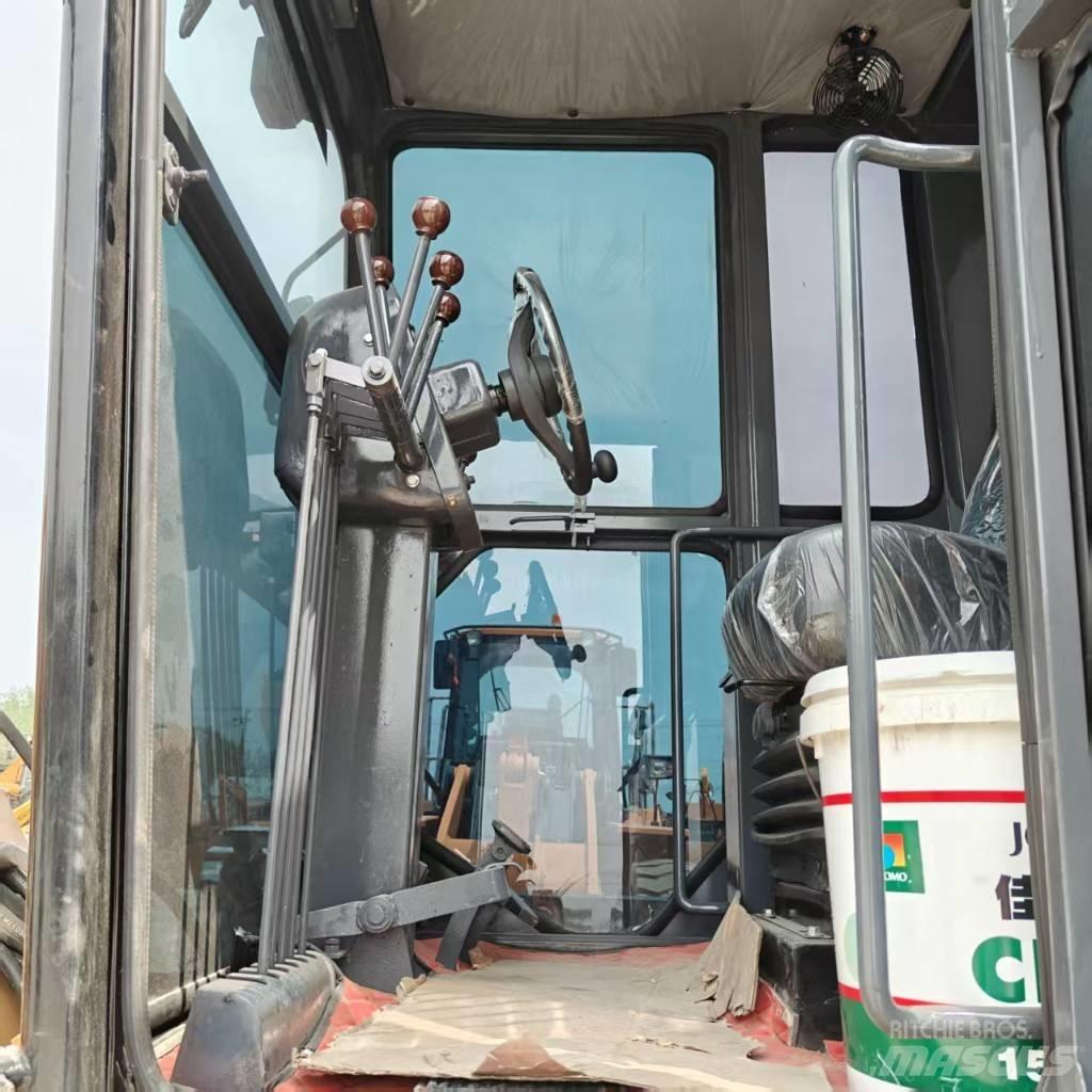 CAT 140 H Bageri guseničari