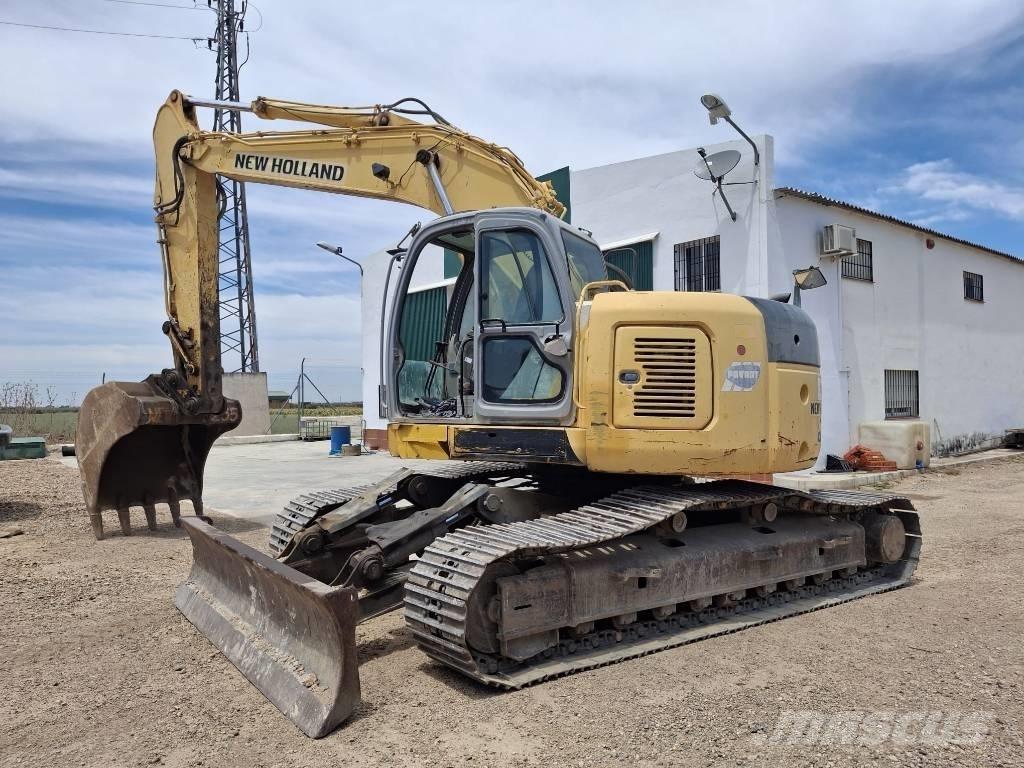 New Holland E 235 SR Bageri guseničari