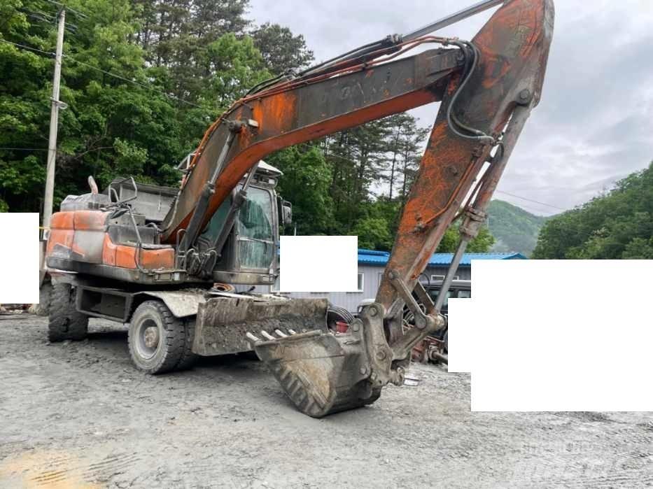 Doosan DX 210 W Bageri točkaši