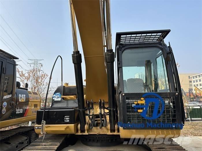CAT 323D/323/323DL Bageri guseničari