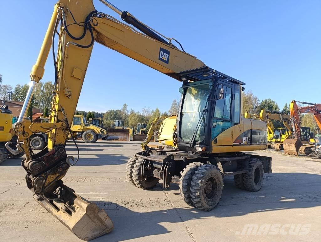 CAT M 318 C Bageri točkaši