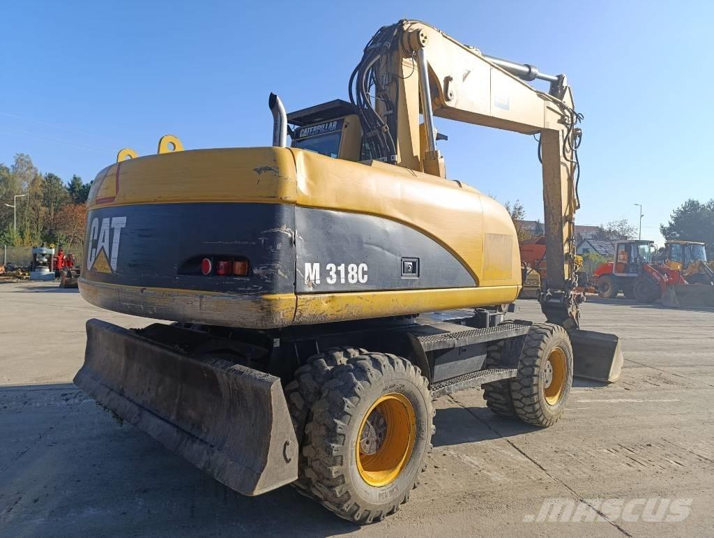 CAT M 318 C Bageri točkaši