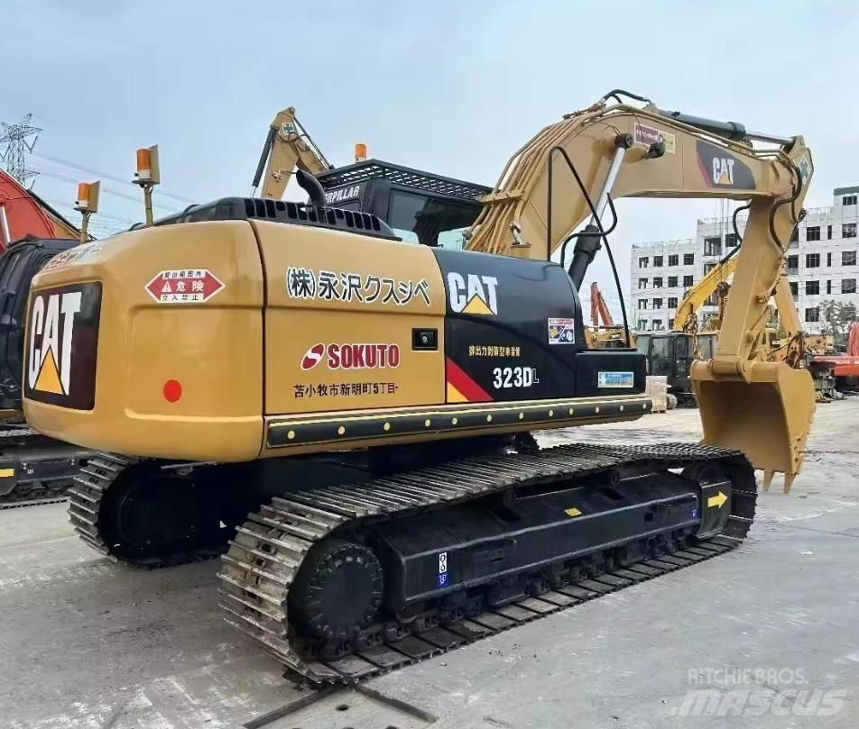 CAT 323 Bageri guseničari