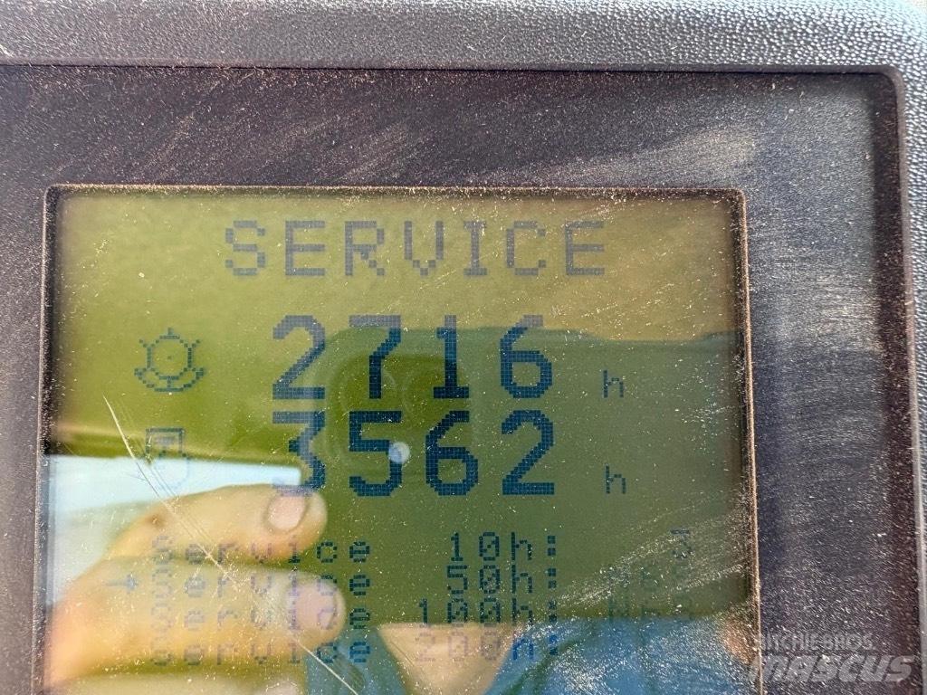 New Holland TX 62 Kombajni