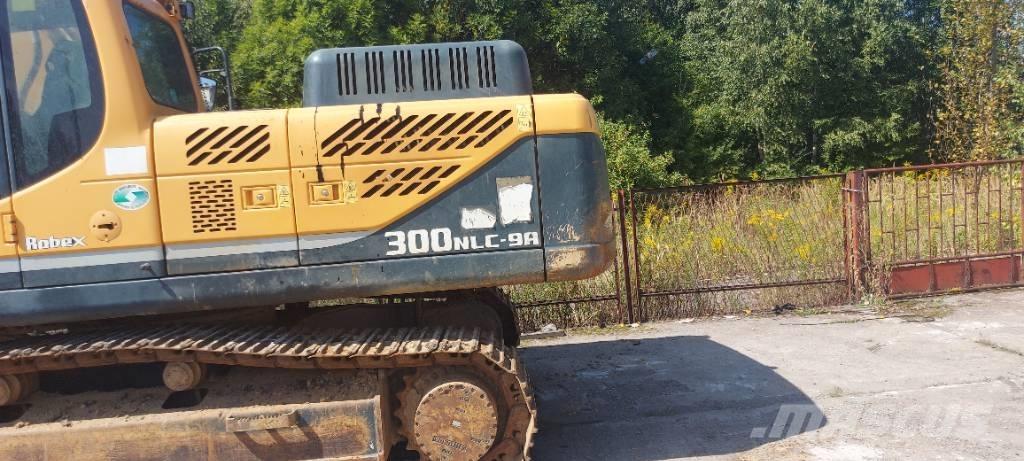 Hyundai NLC 300 Bageri guseničari