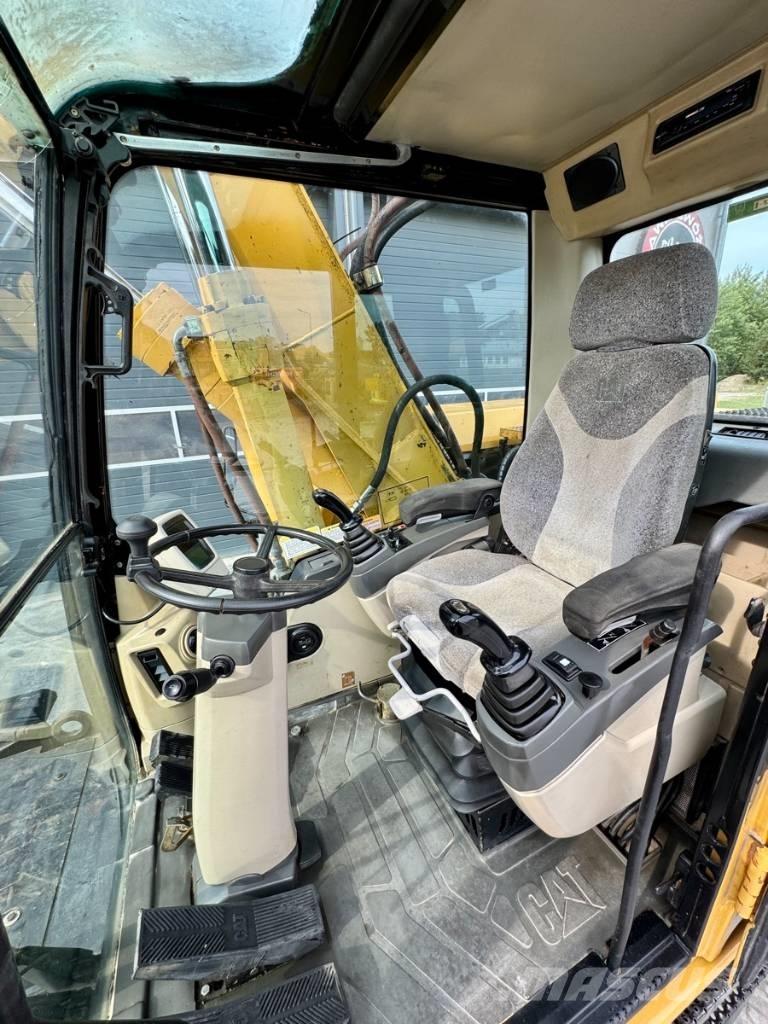 CAT M 318 C Bageri točkaši