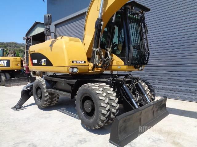 CAT M 318 D Bageri točkaši