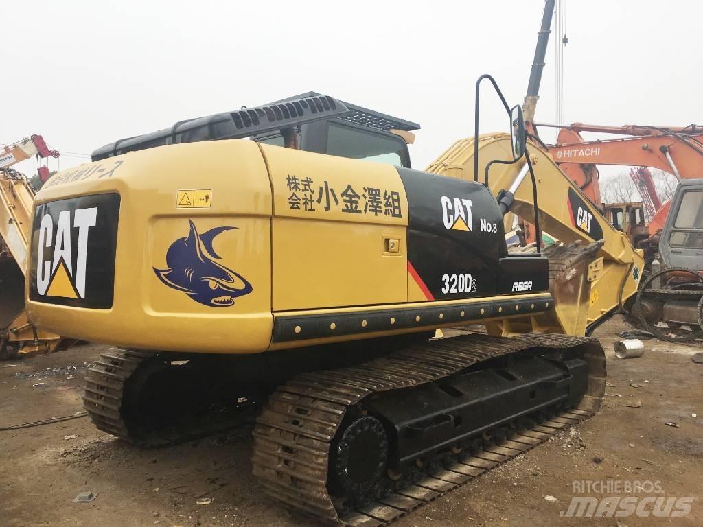 CAT 320 DL Bageri guseničari