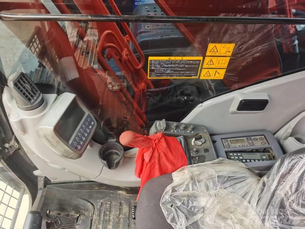 Hitachi ZX 210 Bageri guseničari