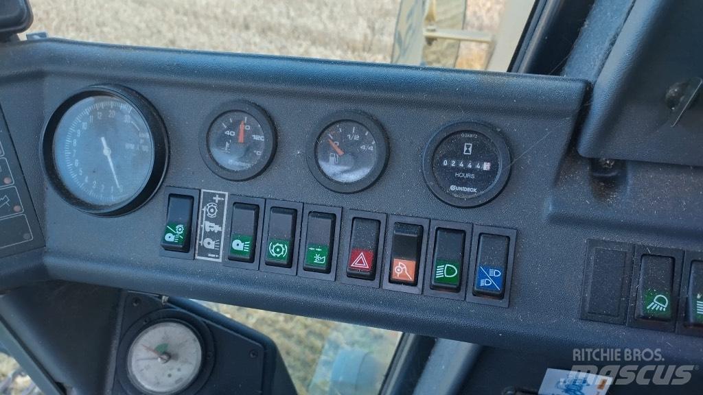 New Holland TC 54 Kombajni