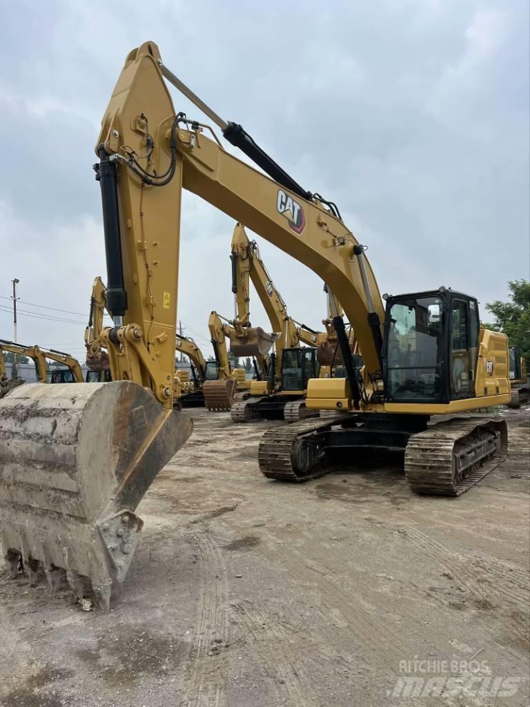 CAT 323 GC Bageri guseničari