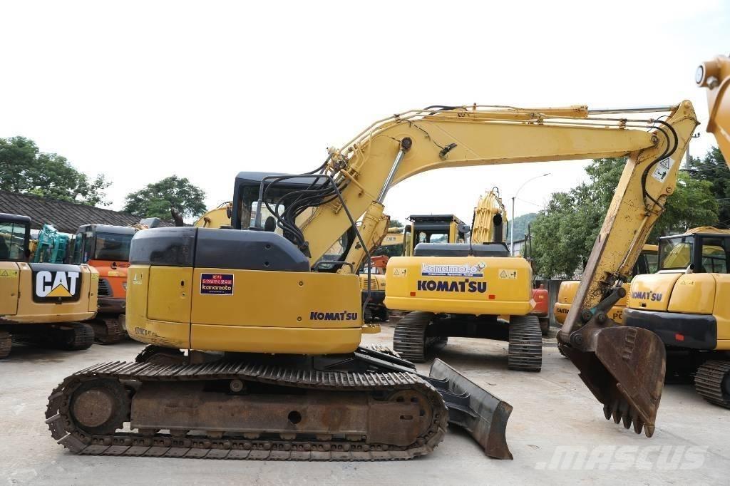Komatsu PC 128 US Midi bageri 7t – 12t