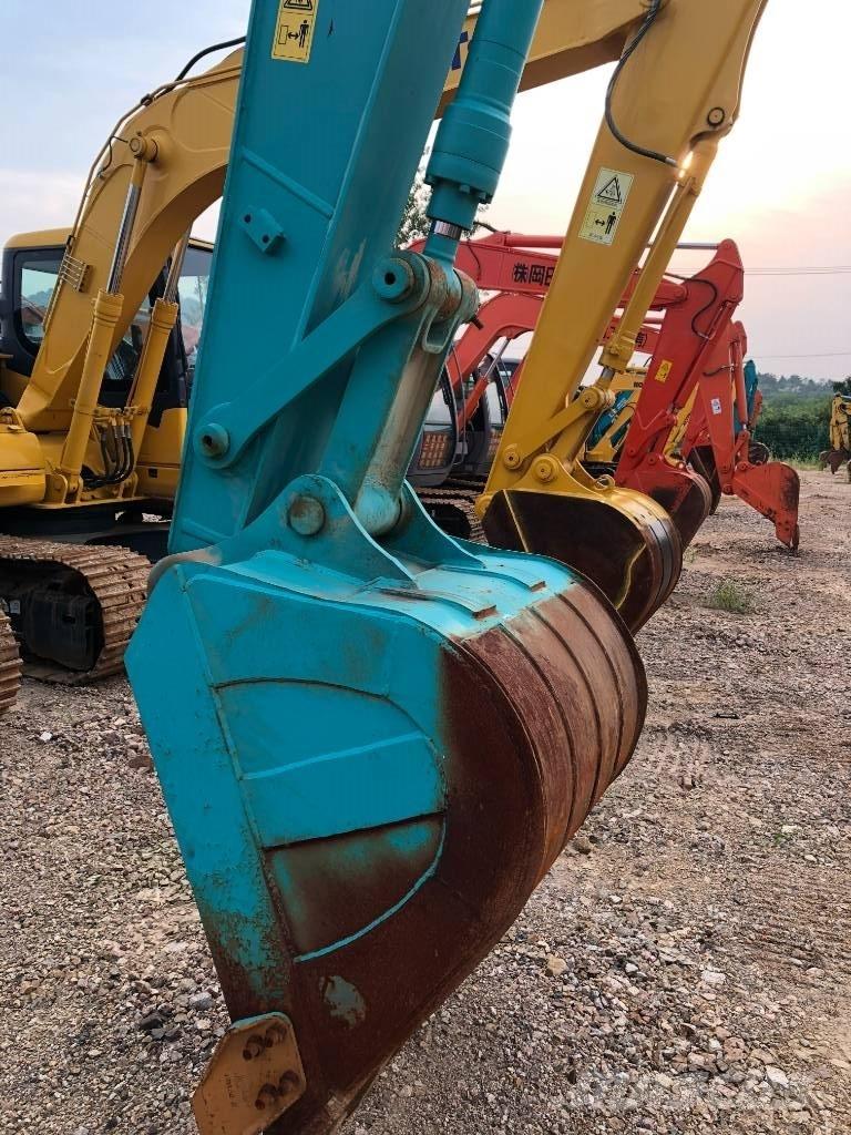  神钢 140 Bageri guseničari