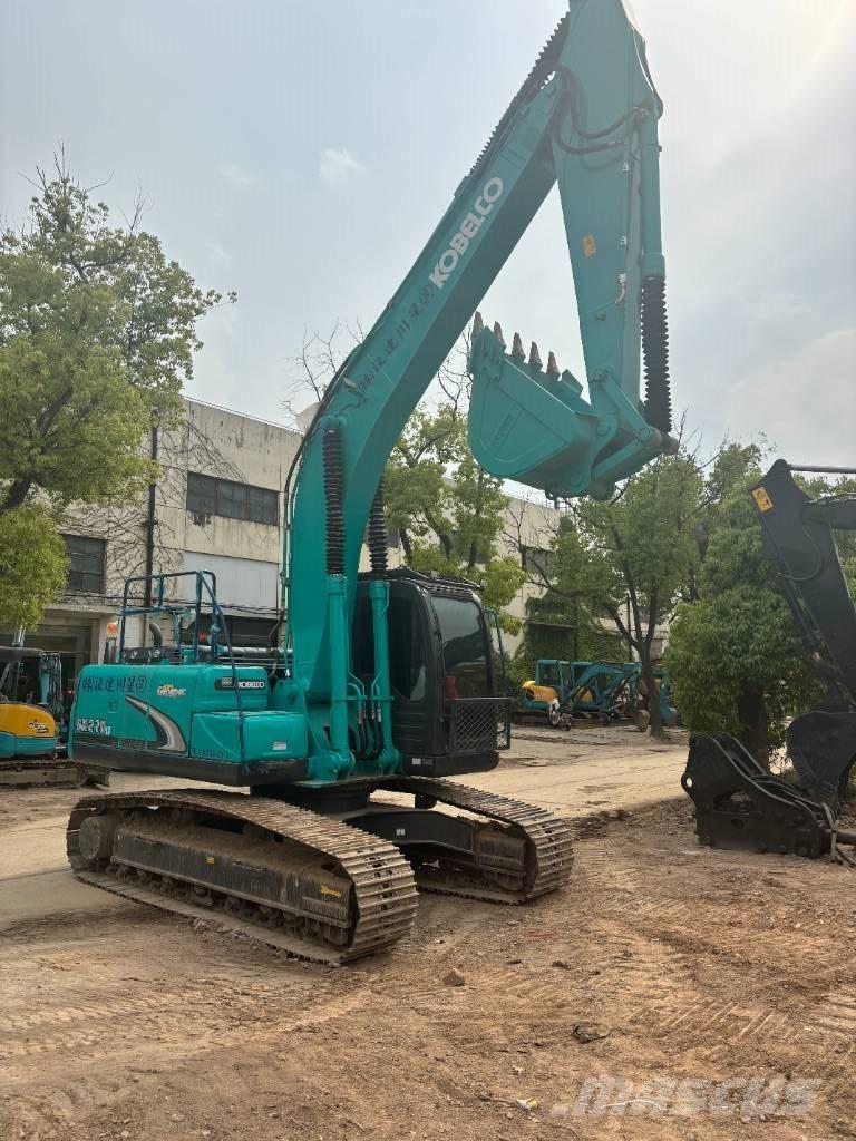 Kobelco SK210 Bageri guseničari