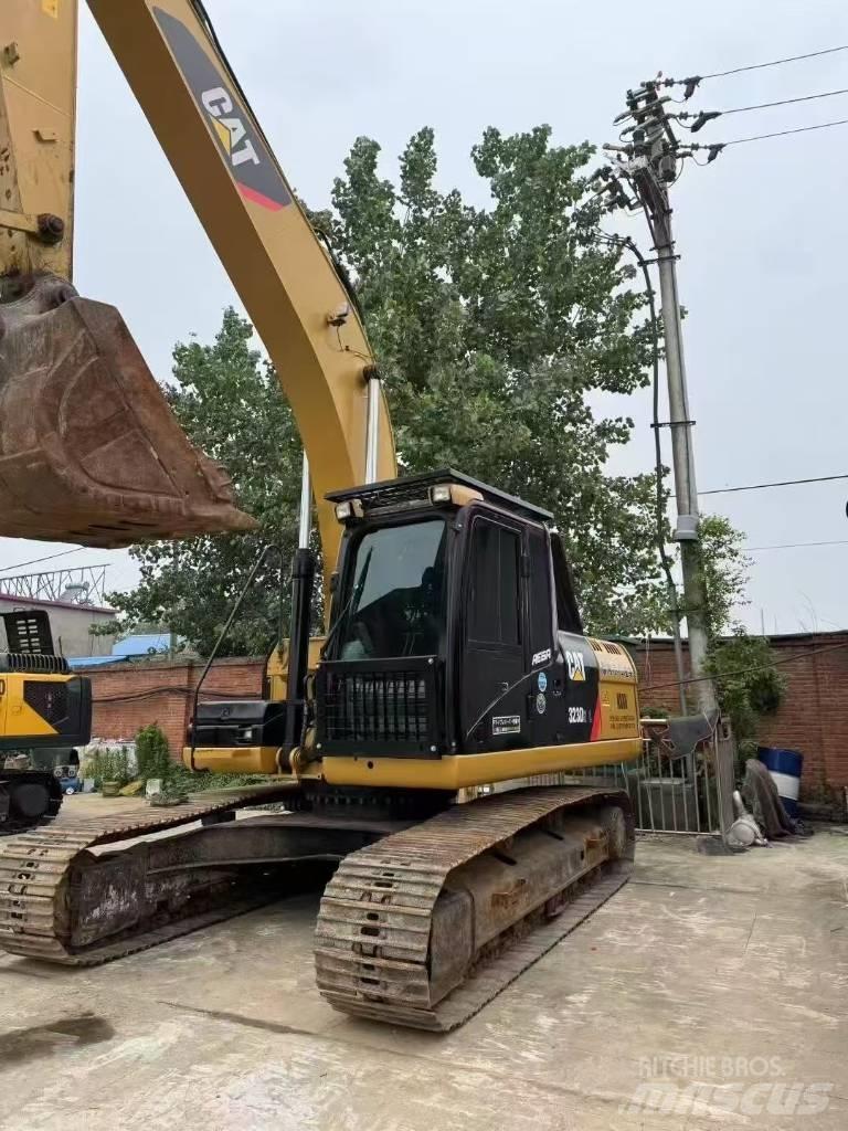 CAT 323D Bageri guseničari