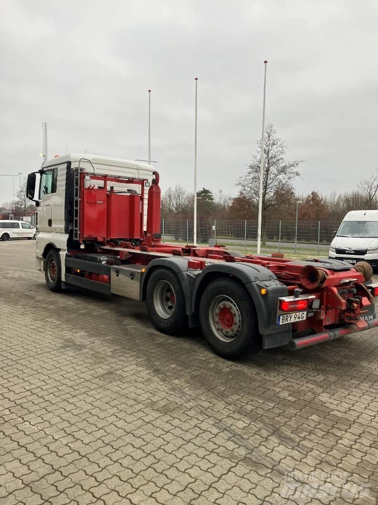 MAN TGX 26.500 6X2 Rol kiper kamioni sa kukom za podizanje tereta