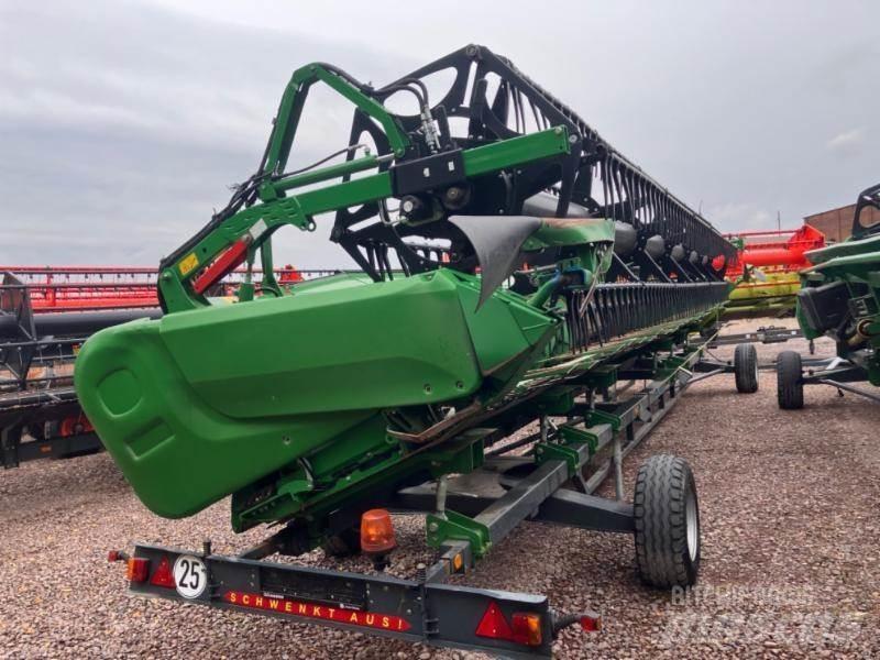 John Deere T 670 Kombajni