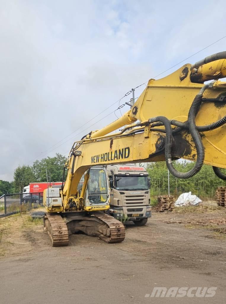 New Holland E 245 B Bageri guseničari